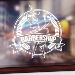 Sticker du logo d'un barbier sur une vitrine